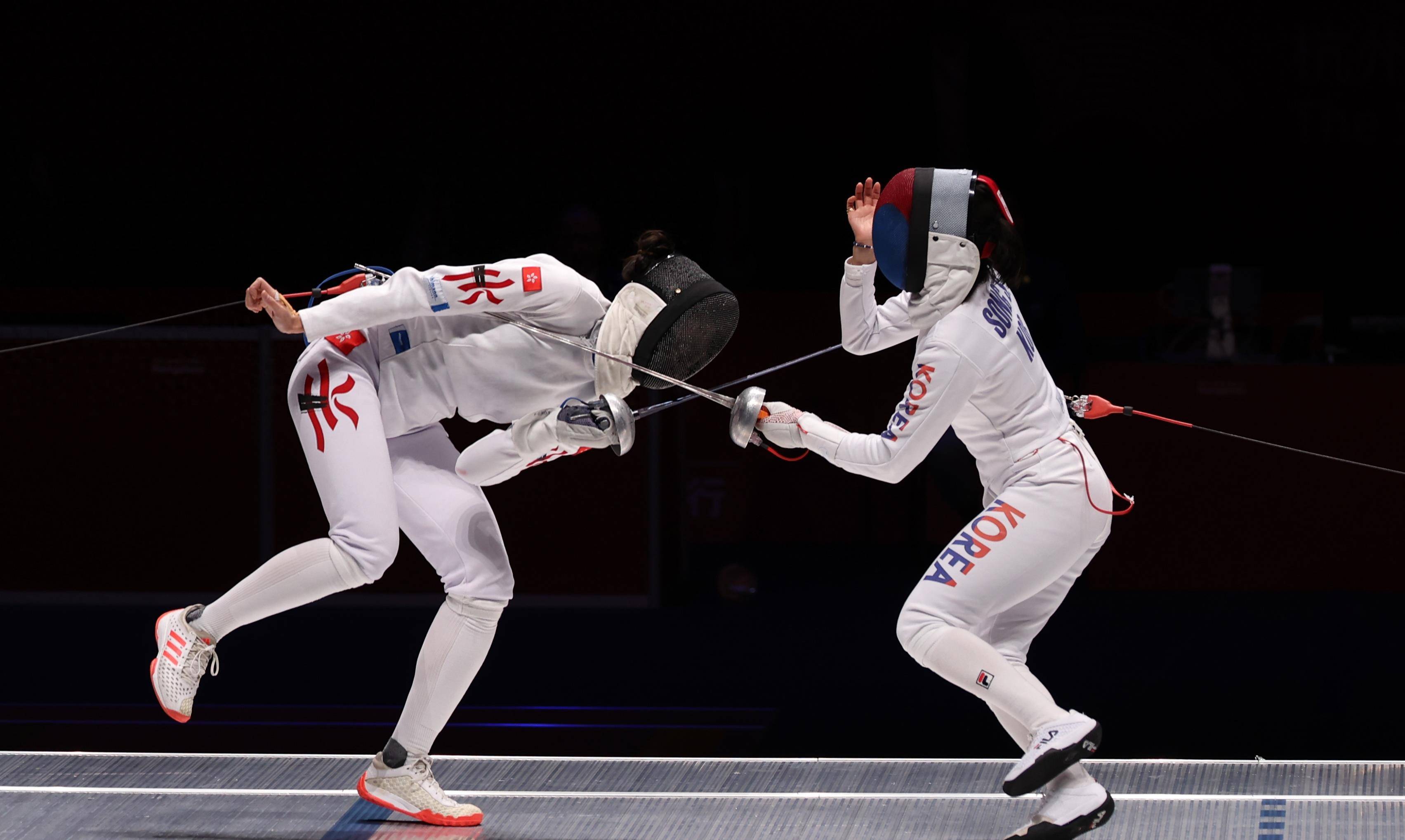 比赛精彩:击剑选手再次逢战 比赛精彩:击剑选手再次逢战